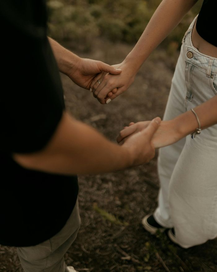 A couple holding hands